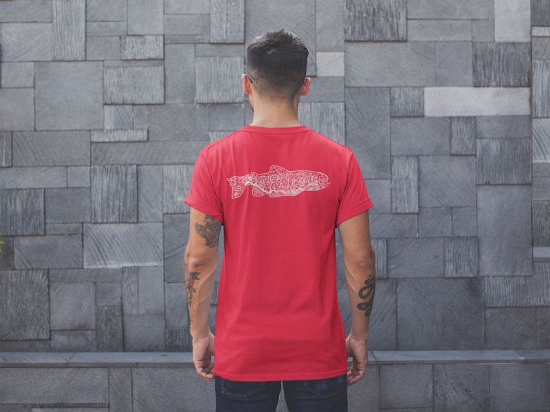 back shot tshirt mockup of a man facing a modern stone wall 20745 (1) — Swag