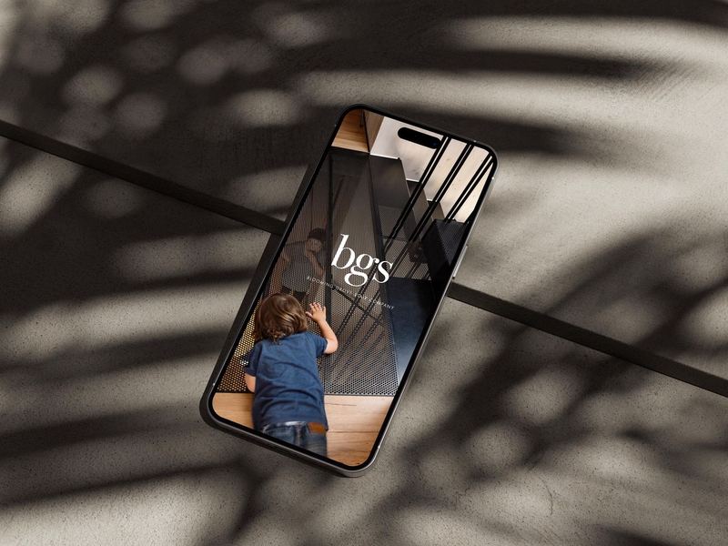iPhone 14 Pro Max on Concrete Mockup 2 — BG Stair Logo