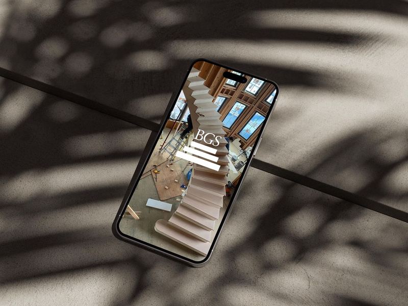 iPhone 14 Pro Max on Concrete Mockup 3 — BG Stair Logo