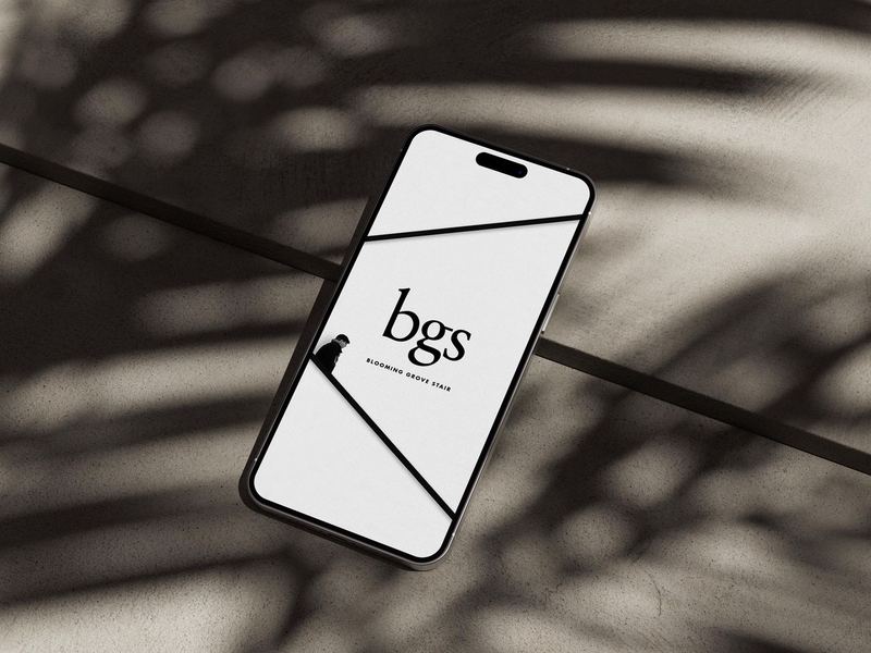 iPhone 14 Pro Max on Concrete Mockup 1 — BG Stair Logo