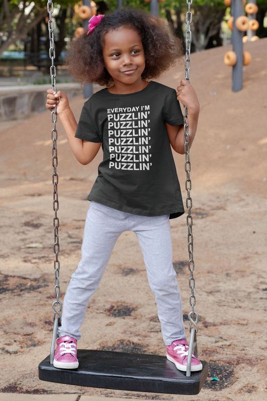 t shirt mockup of a playful girl standing on a swing 32179 — PUZZLE SWAG