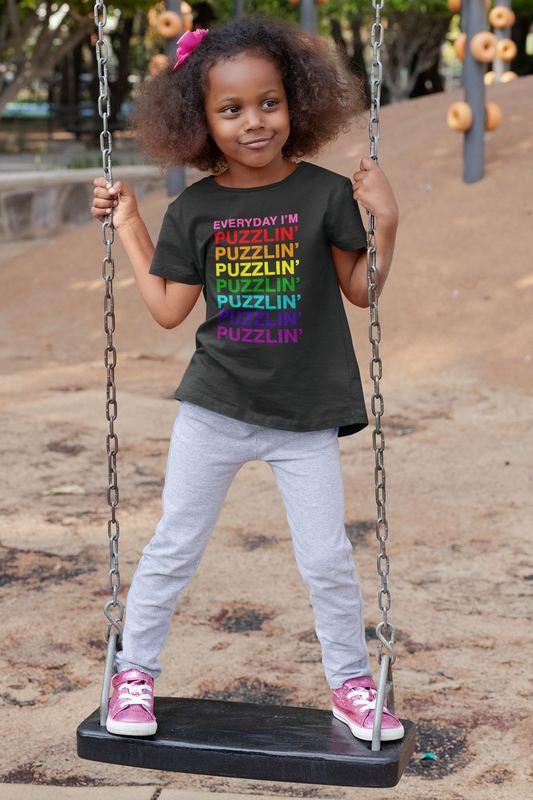 t shirt mockup of a playful girl standing on a swing 32179 (2) — PUZZLE SWAG